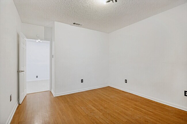 Building Photo - Spacious Dallas Condo with Unbeatable Storage, Private Patio & Carport