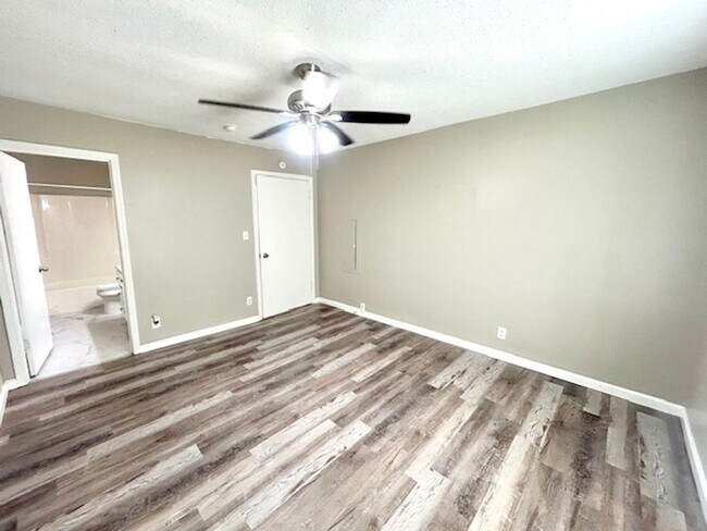 Building Photo - Spacious 4-Bedroom, 2-Bath Home Located in...
