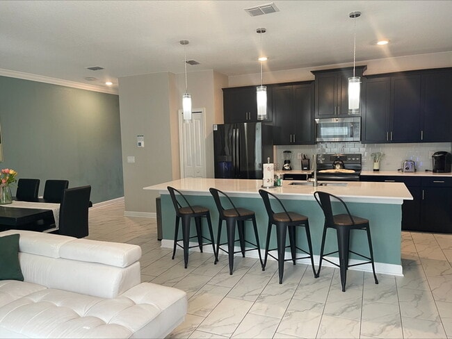 Building Photo - Furnished 4 bedroom Resort Community Townhome