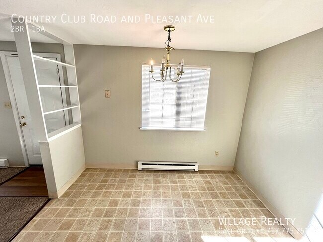 Building Photo - 605 Country Club Rd