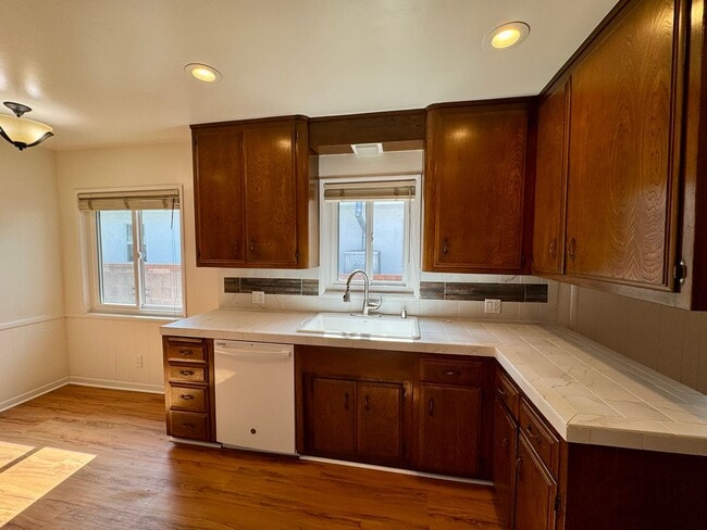 Building Photo - Charming 4-Bedroom Home on a Quiet Tree-Li...