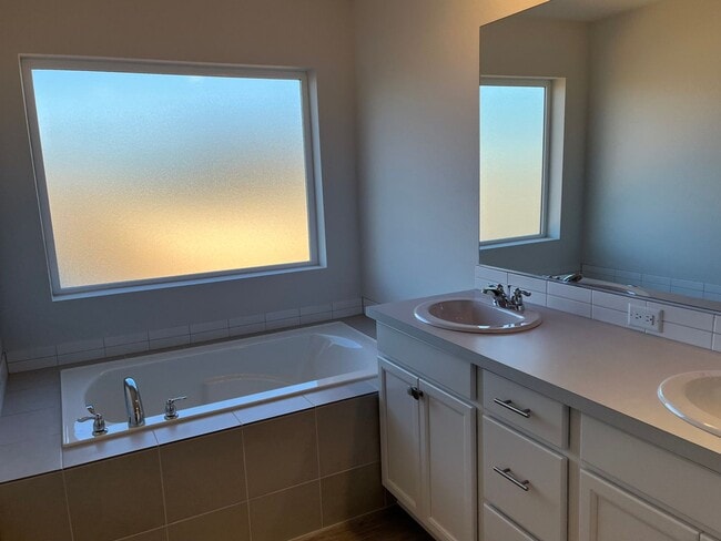 Building Photo - New Construction! Four Bedroom Home in Woo...