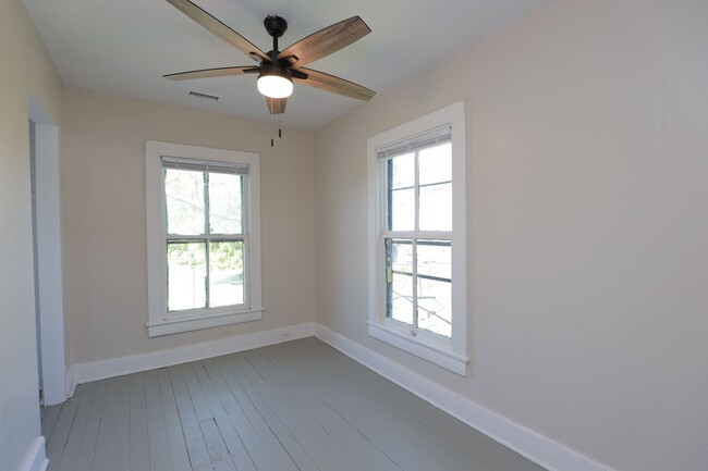 Building Photo - Charming 4-Bedroom Home with Hardwood Floo...