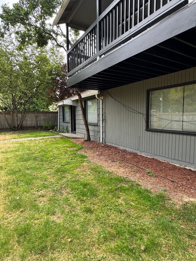 Building Photo - Spacious Two Story (2BR/1BA) Home with Large Fenced-In Yard