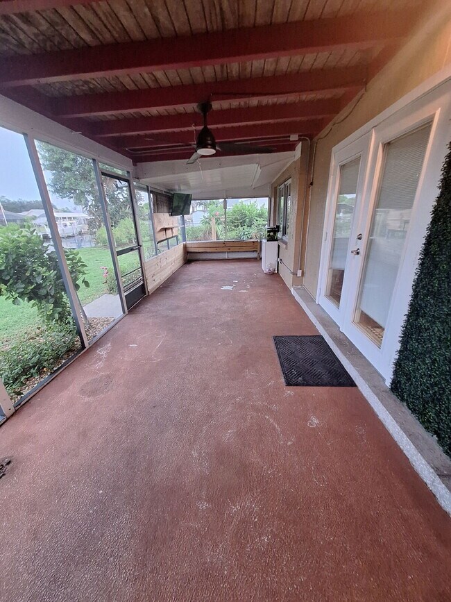 Building Photo - Gulf Access Home on Canal Available Now