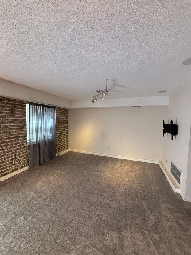 Building Photo - NEW LISTING!  3-bedroom, 3.5-bath townhome...