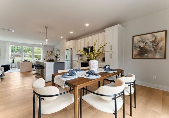 Building Photo - FREE RENT! Stunning 4 Bed | 3.5 Bath Luxury Townhome at The Towns at Rocky River