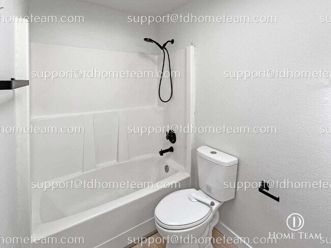 Building Photo - "Charming 3-Bedroom Retreat with Cozy Fire...