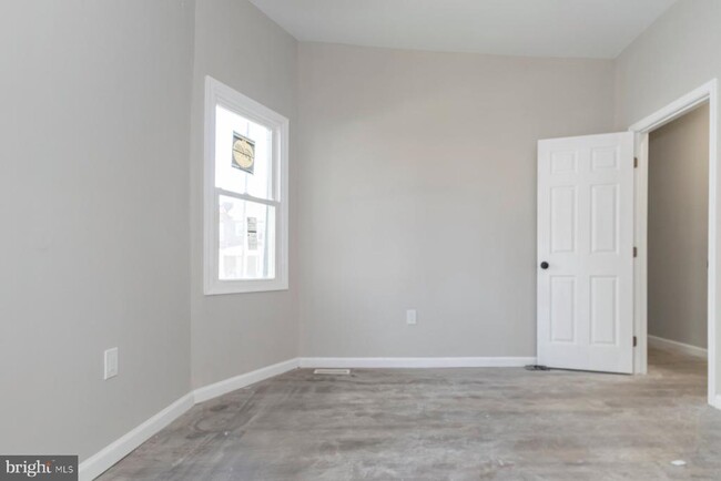 Building Photo - 3026 W Garrison Ave