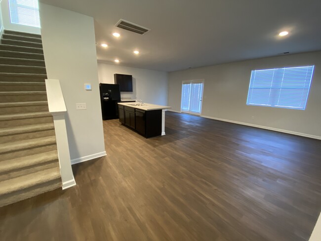 Open concept living/ dining area - 9010 Fenton Rd.