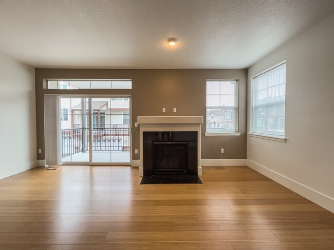 Building Photo - Enjoy this 3 Bedroom 2.5 Bathroom End Townhome ~ 2 Car Garage + Washer & Dryer! Great Cedar Mill ...
