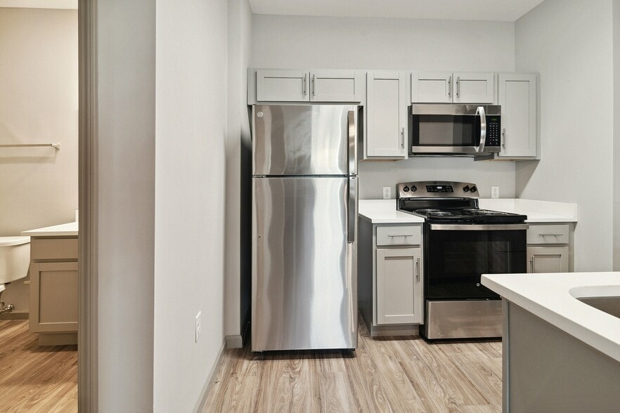 Newly Renovated Kitchen - Riverwalk Apartments