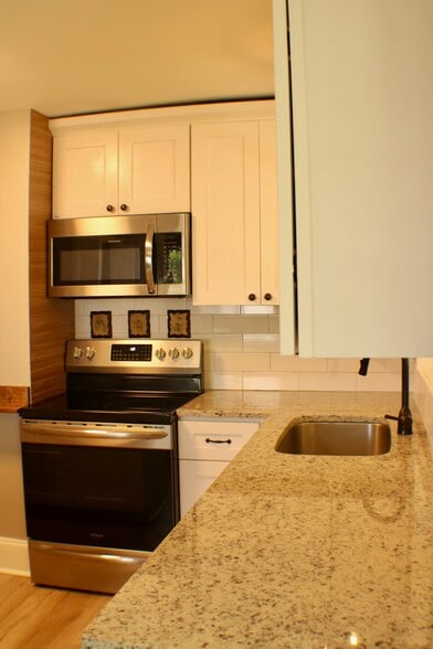 Microwave and oven in kitchen - 311 Paris Mountain Ave