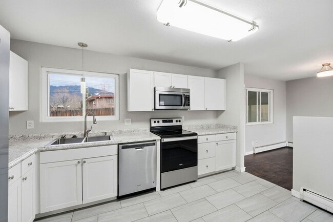 Building Photo - Updated 4BR Home with 2-Car Garage in Stratmoor