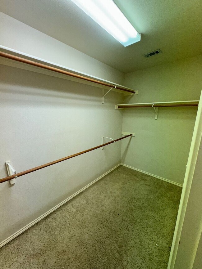 Building Photo - Ready For Move In! A Must See in Rogers Ranch - 4 Bedroom 2 Bath with Custom Features