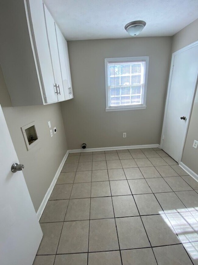 Building Photo - A Quiet Location, $200 Move-N-Special