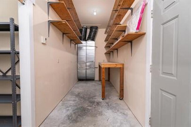 Building Photo - Uniquely breathtaking custom home with in-...