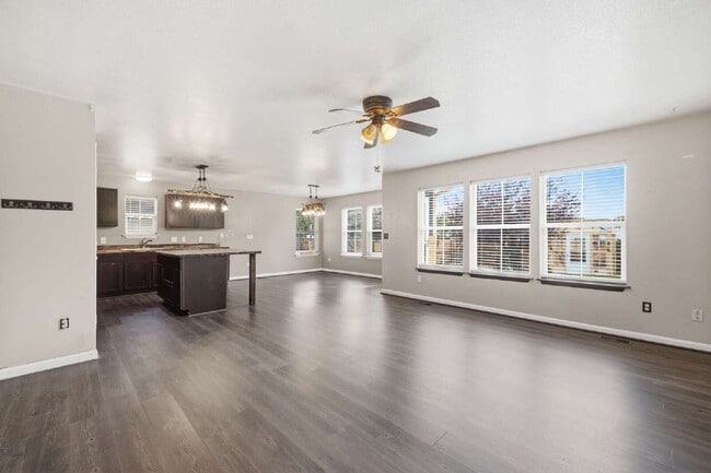 Building Photo - Spacious 5-Bed Retreat with Modern Updates in Aurora. Included - Greenhouse and Shed!