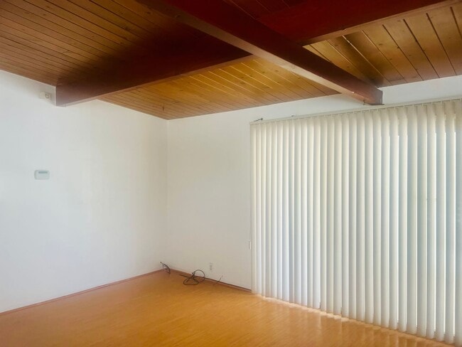 Building Photo - Charming 3-Bedroom Home with Wood Ceilings...