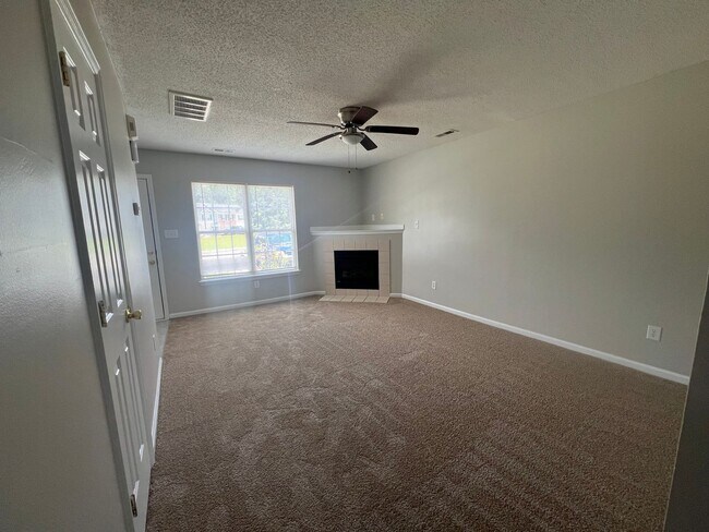 Building Photo - This property features 2 bedrooms and 2.5 bathrooms. Conveniently located near shopping centers, ...