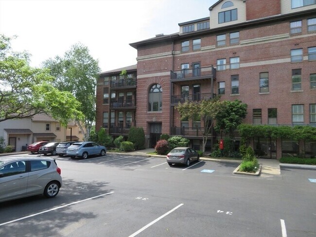 Building Photo - Updated 2BR / 2BA Condo with Private Deck & In-Unit Laundry at Academy Park
