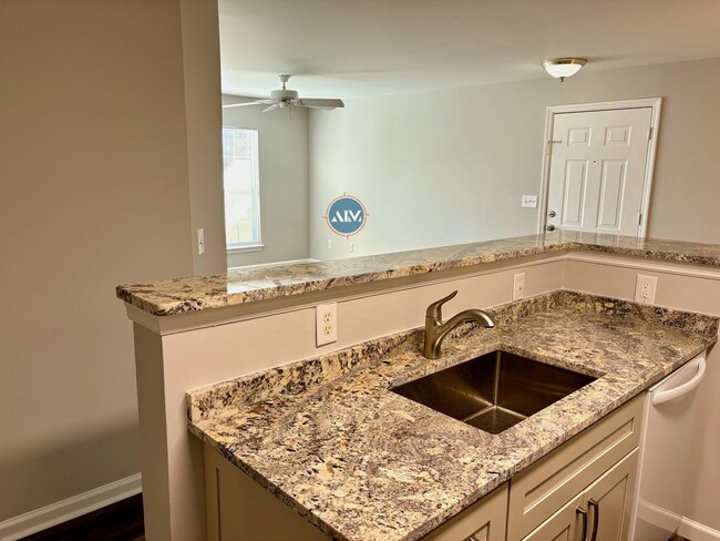Building Photo - Modern 3-Bed Condo: Lovely Appliances, LVP...