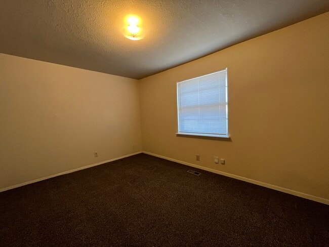 Building Photo - Sheridan Duplexes 01-03