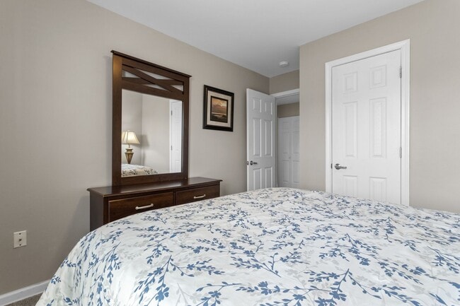 Building Photo - Welcome to Coastal Living at Harbor Landing Condominiums!