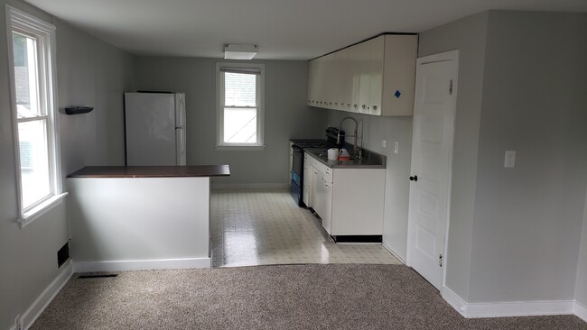 New Stove, Eat-In Kitchen with bar seating facing Living Room - 211 N Prairie St