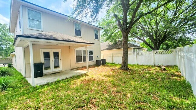 Building Photo - Spacious 4BR w/ Fenced Yard + Covered Lanai + 2 Car Garage  in Orange Park!