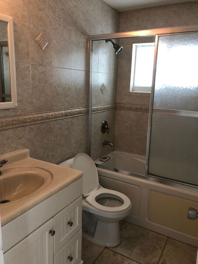 Building Photo - Large 3-2 with impact windows