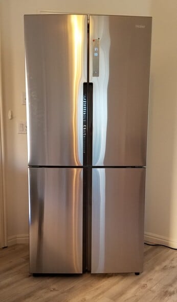 New finger-print resistant stainless steel fridge w/ LED lighting & digital thermostat (in unit) - 137 E 755 S