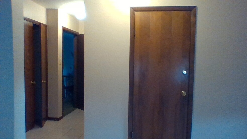 Front entrance on left/closet in center - 2214 N 74th Ct