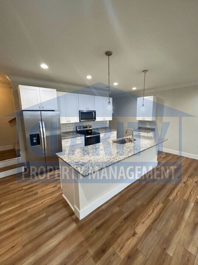 Building Photo - **One month free w/ a 15 month lease!**