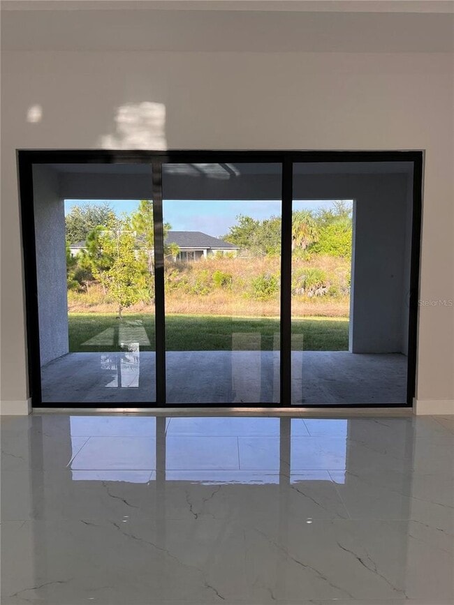 Building Photo - Be the first in occupy this 2025 constructed home in the vibrant city of Port Charlotte, FL! Qual...