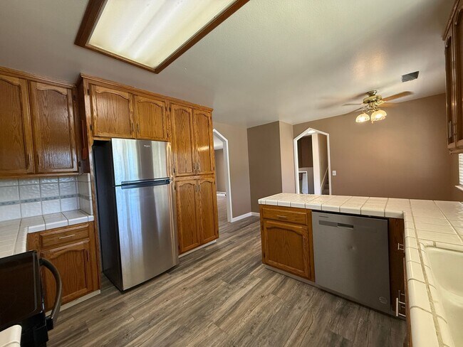 Building Photo - Stunning three-story home located in the c...