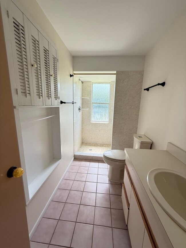 Building Photo - 2/2 with Fenced Yard, Garage and Laundry, Available Now!