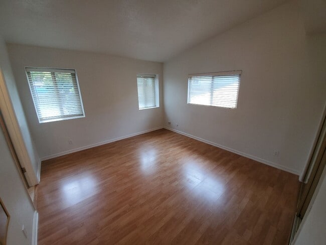 Building Photo - This gorgeous Pine Hills home has a large interior, 2-car garage, and fully-fenced yard!