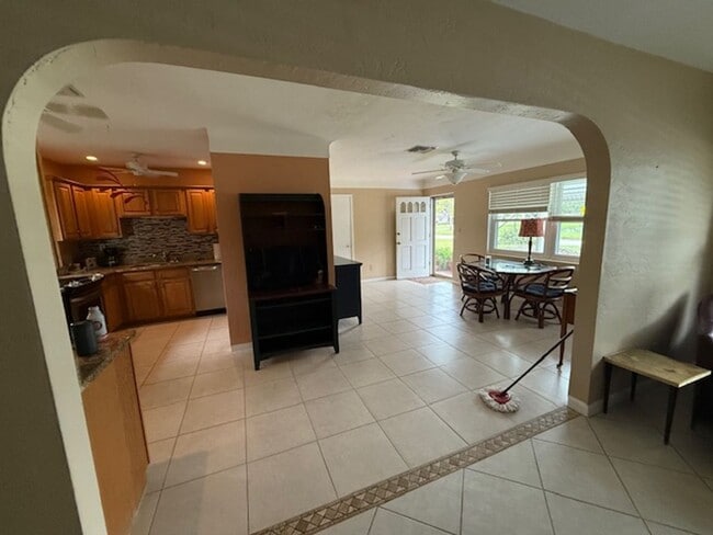 Building Photo - Well maintained 2/2 with a large yard in a...
