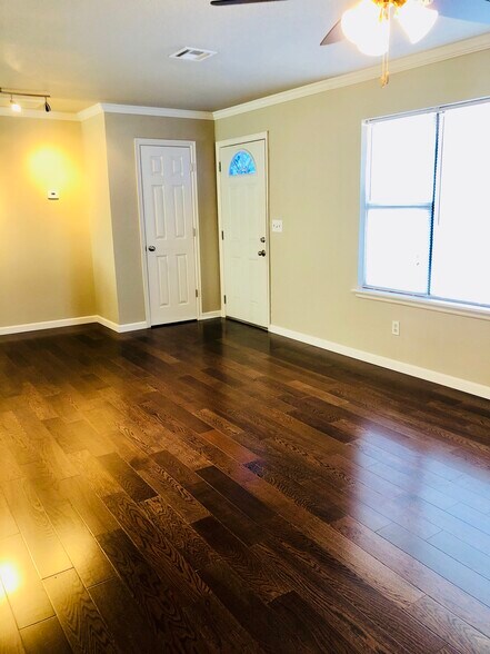 Living room view of front door. - 5614 W 3rd St