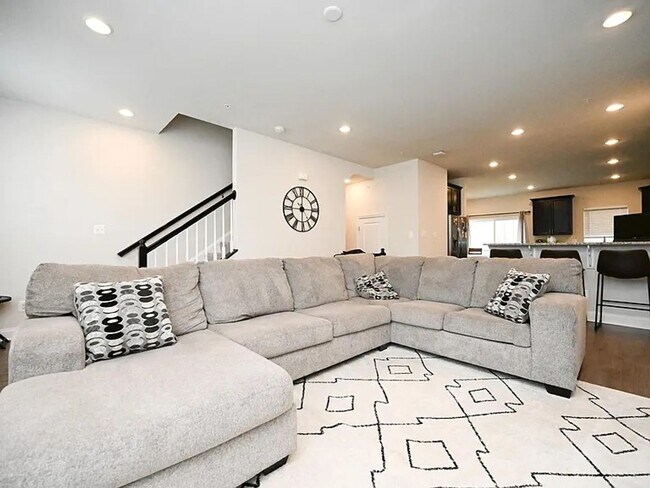 Building Photo - Stunning 3-Story Brick-Front Townhome | Modern Living + Military & First Responder Discount