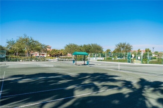 Building Photo - Experience Bell Tower Park. GATED ground floor 2 Bed 2 Bath Den 1 Car Garage Condo.