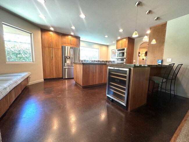 Building Photo - Beautiful 3-Bedroom Home with Open Floor Plan & Private Backyard