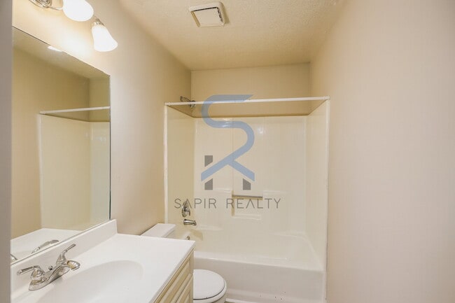 Building Photo - Move in before December 15th and choose your reward: a $250 Amazon Gift Card or a 55" Smart TV!