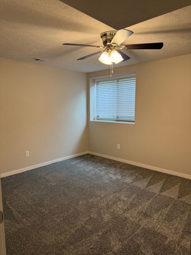 Building Photo - Walkout ranch townhome with 2 stall garage...