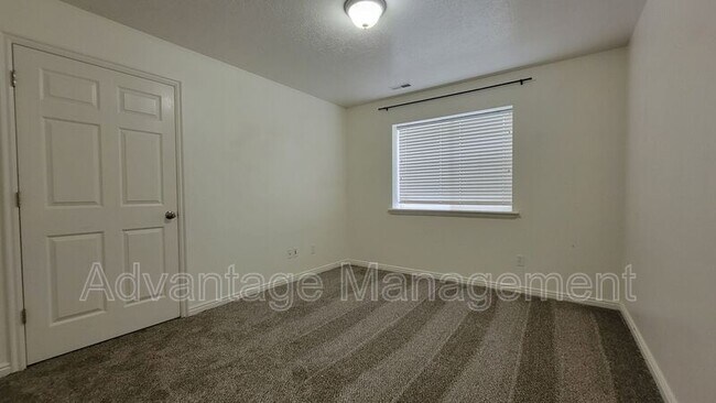 Building Photo - 8083 N Ridge Loop E