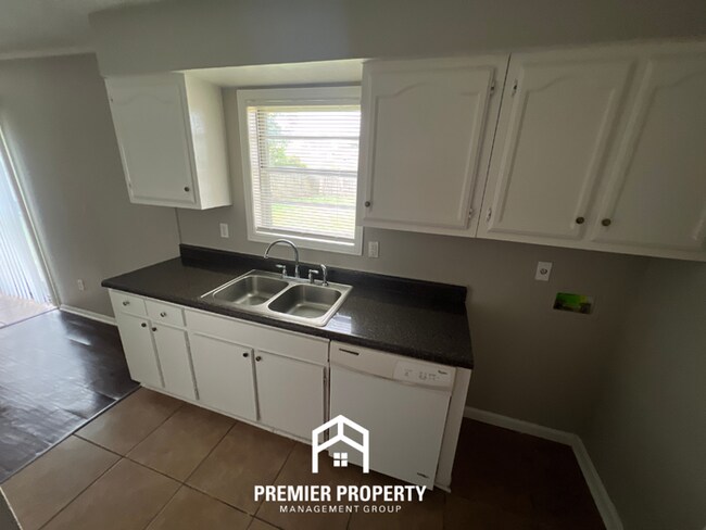 Building Photo - HALF OFF FIRST MONTHS RENT! Charming 3BR/1.5BA in 38118 | Hardwood Floors & Spacious Fenced Backyard