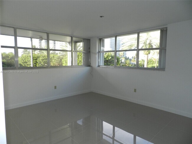 Building Photo - 10230 Collins Ave