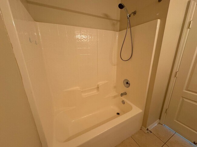 Building Photo - Beautiful 3/2 home near Lake Nona ~ Fenced In Yard ~ LVP & Tile Flooring ~ Community Pool!