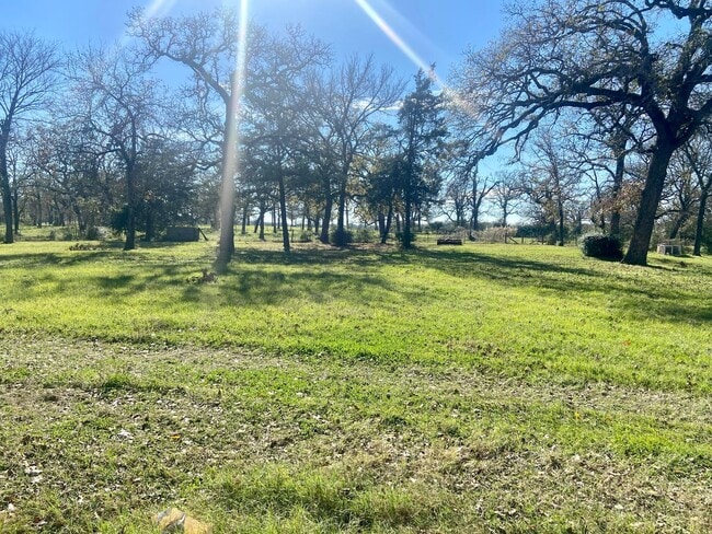 Building Photo - Beautiful 3/2 Farmhouse on Acreage with Ho...